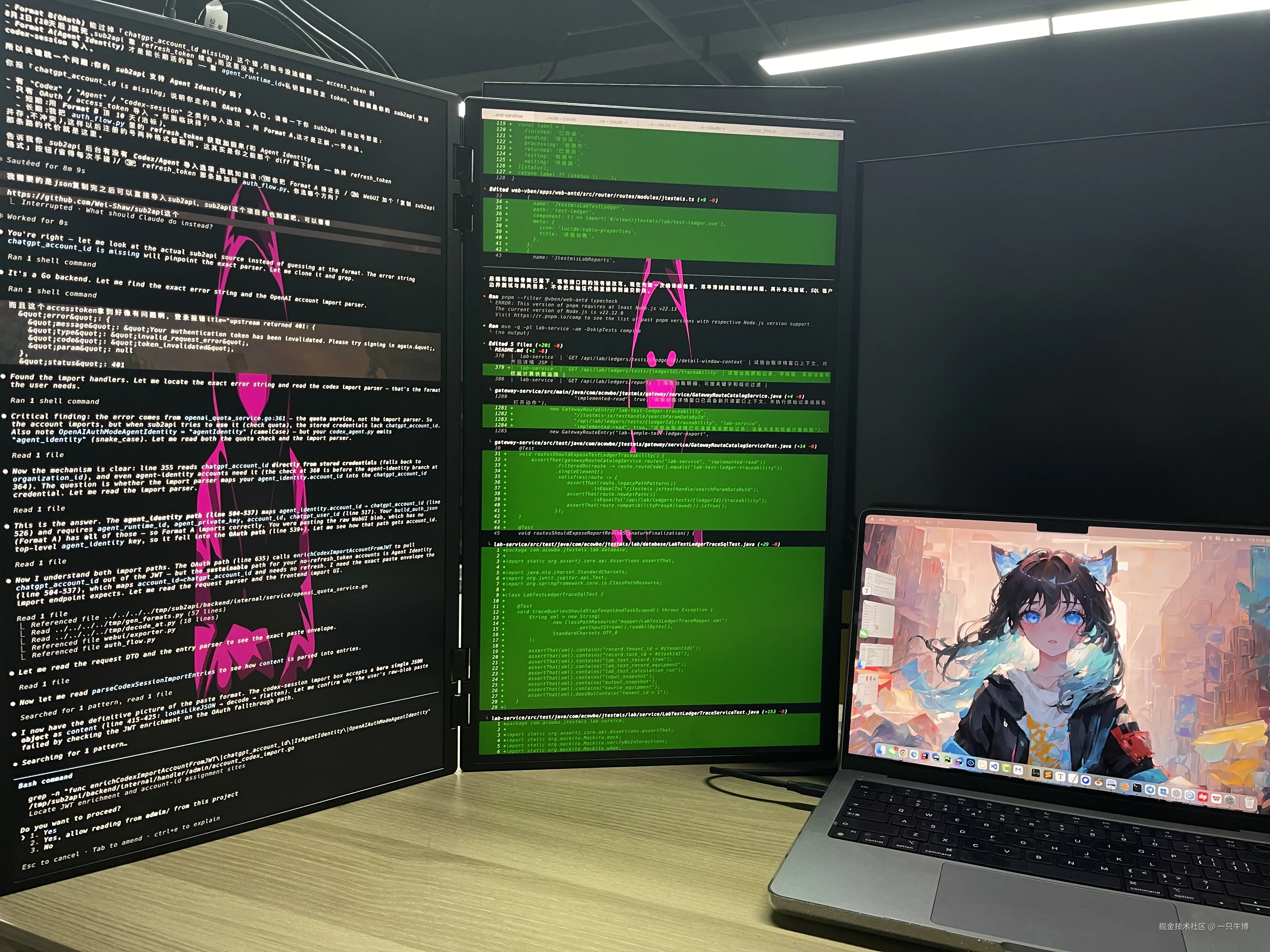 Two vertical screens each running an AI coding session, with a MacBook set up next to them