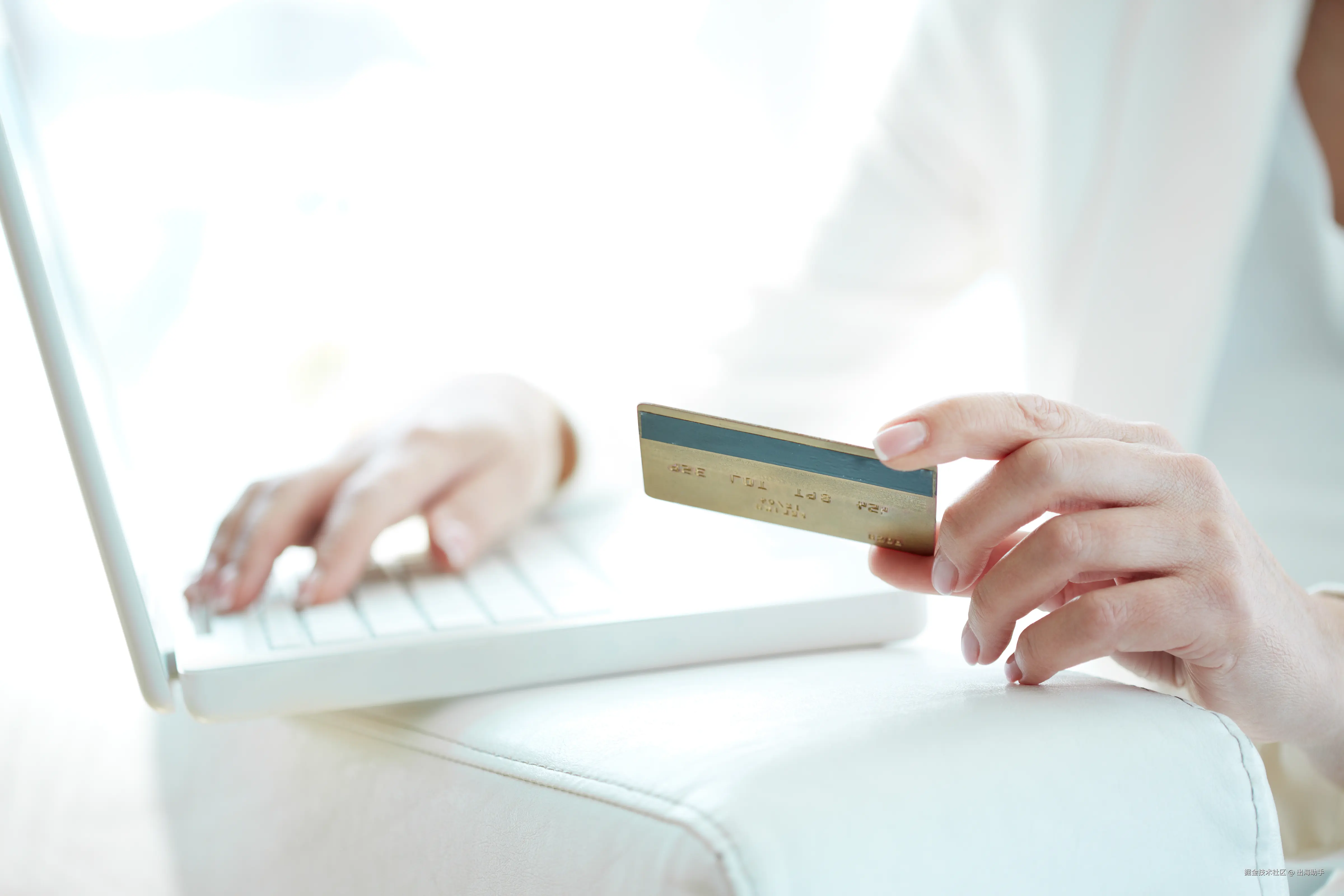 close-up-woman-shopping-online-with-credit-card-laptop.jpg